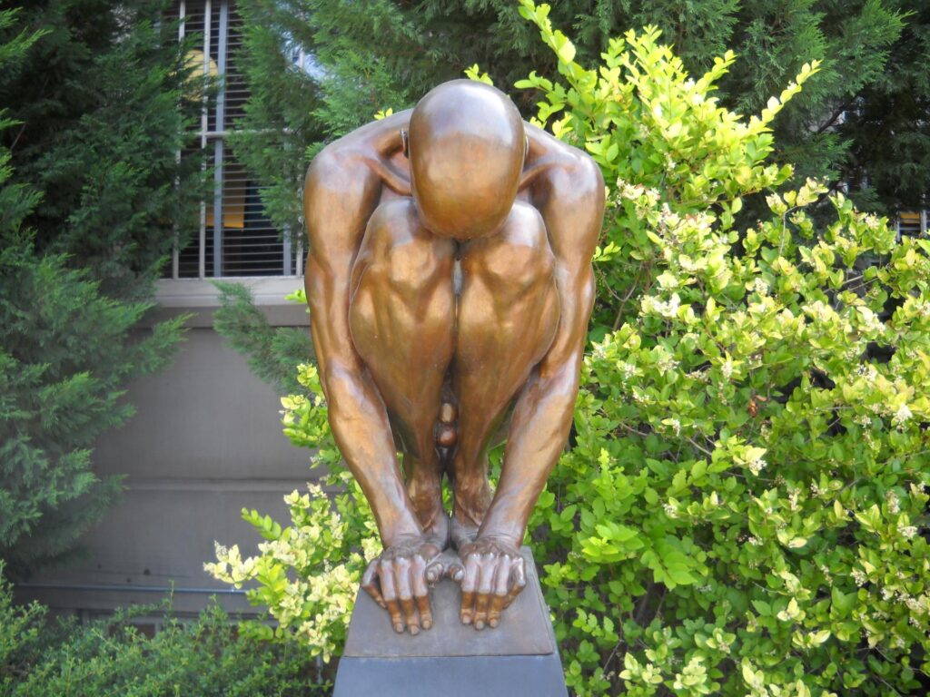 Crouching Man Sculpture