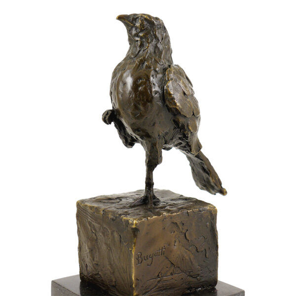 bronze bird sculpture