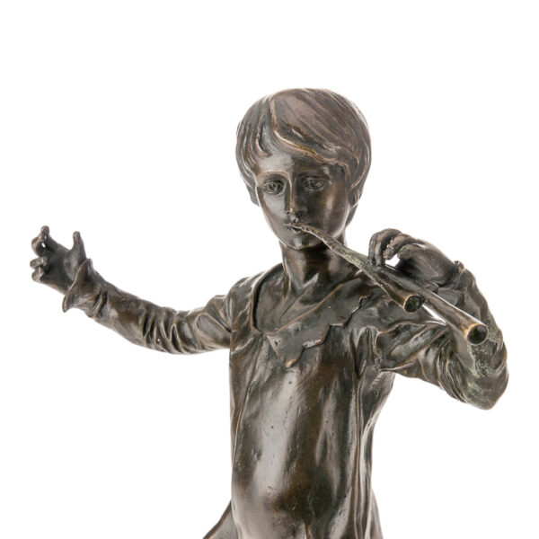 bronze peter pan statue