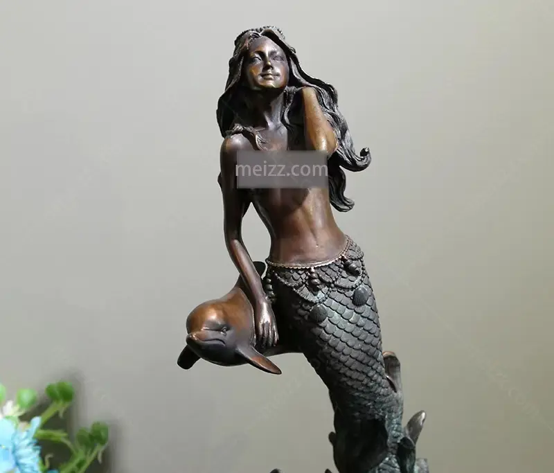 Mermaid and Dolphin Statue