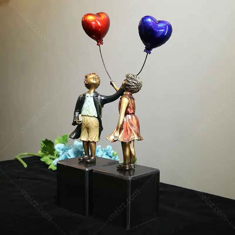 boy and girl statue
