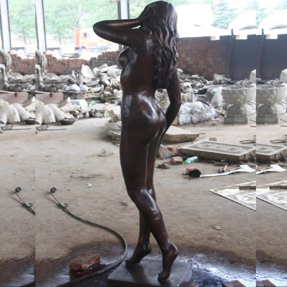 naked woman garden statue