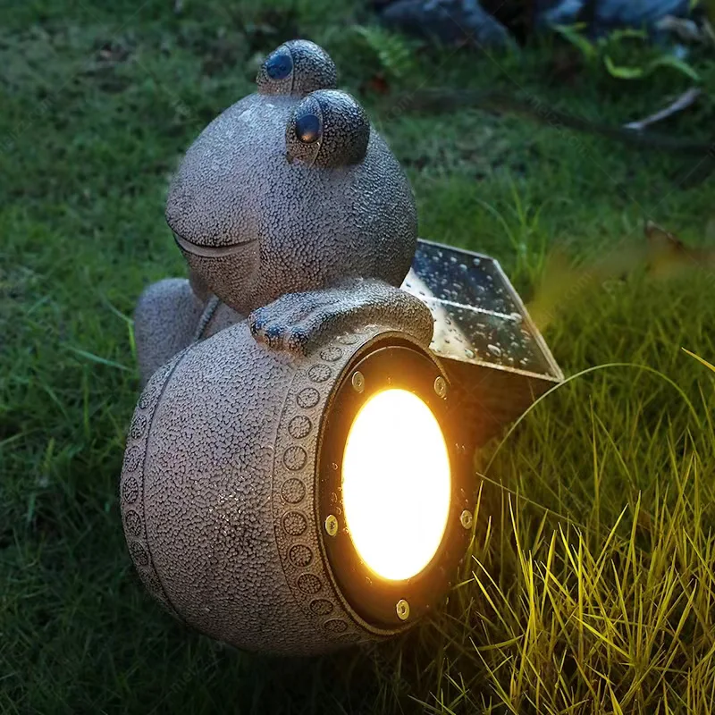 solar frog statue