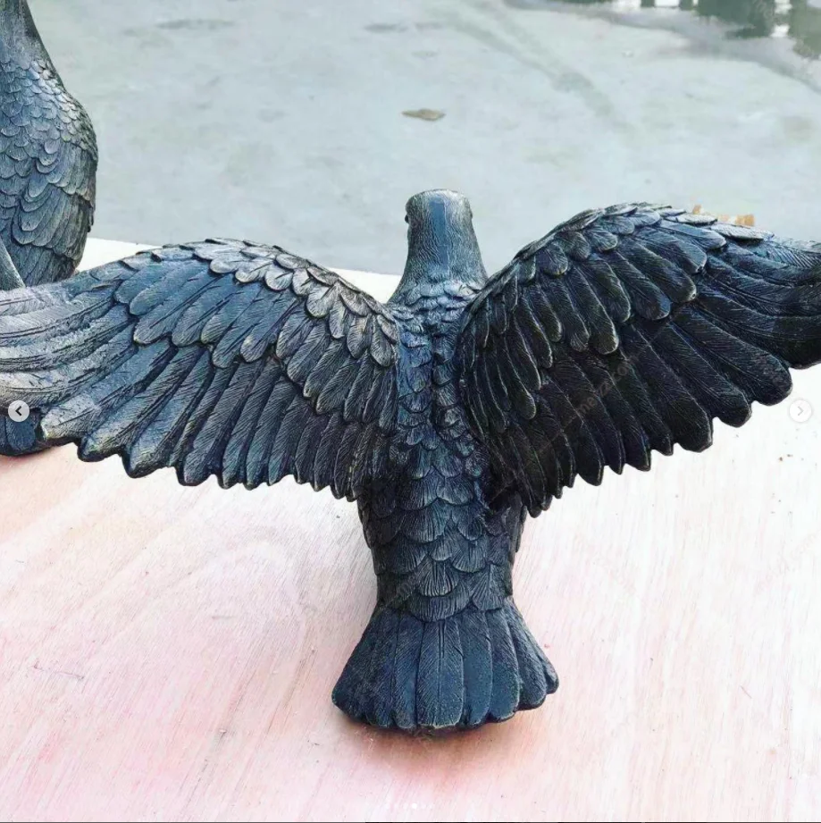 bronze pigeon statue