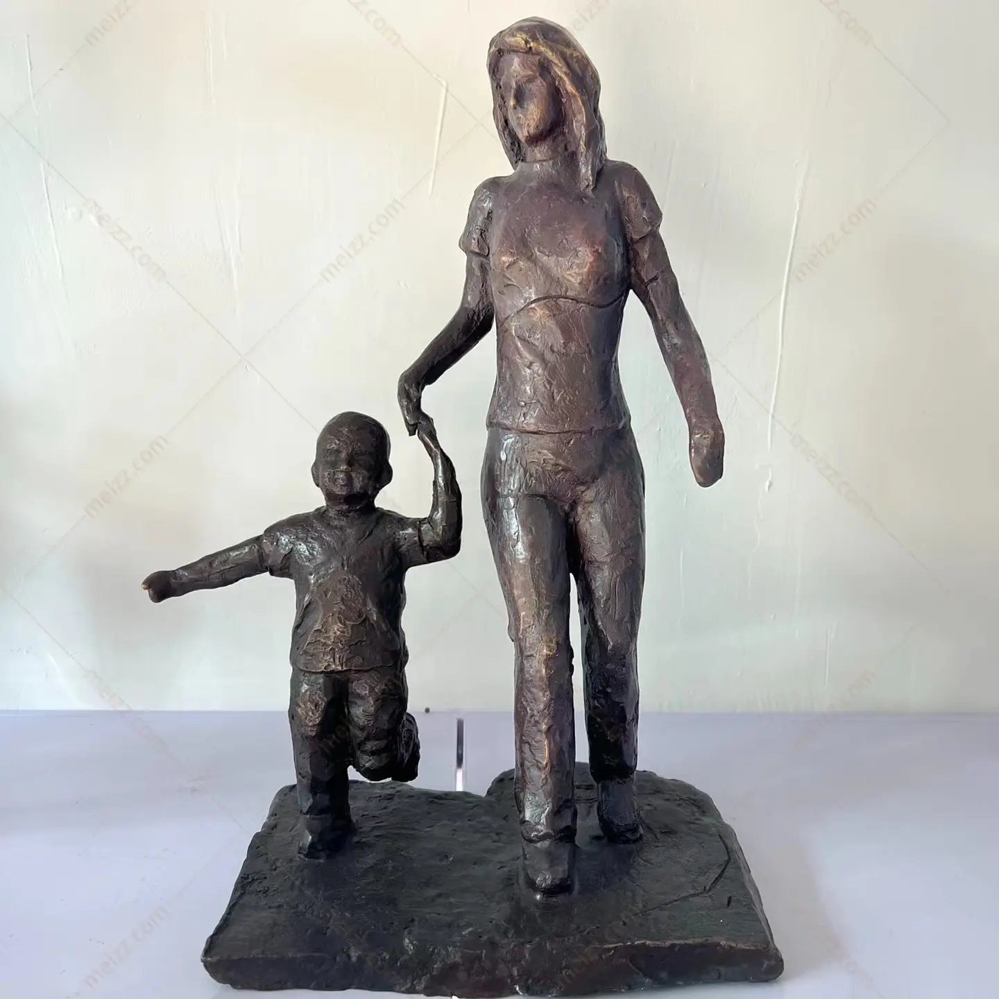 mother and child statues