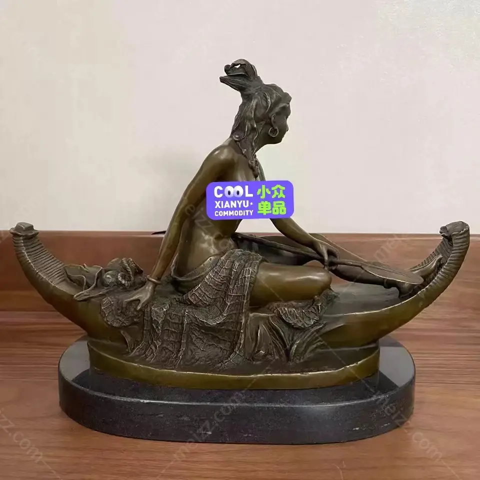 woman on boat statue