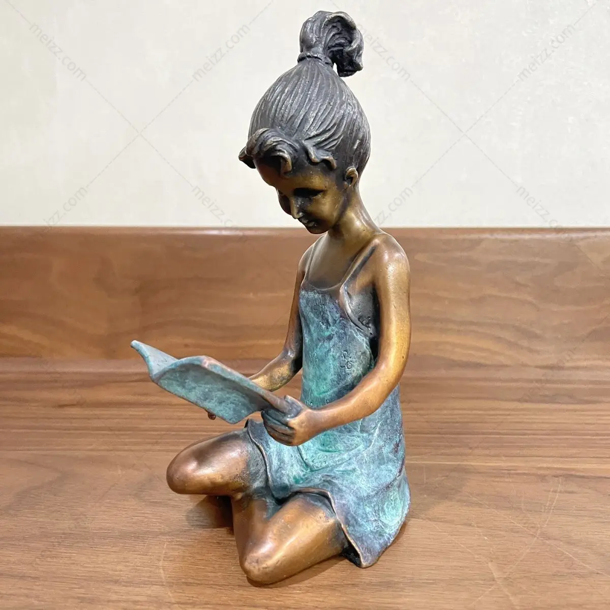 Reading children sculpture
