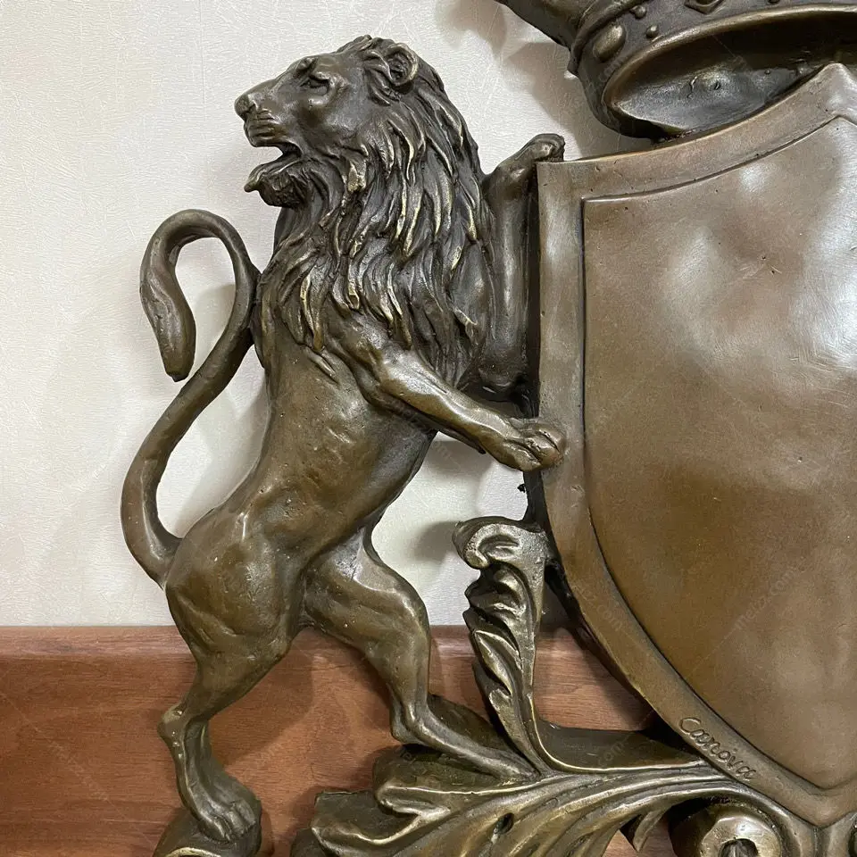  lion statue with shield