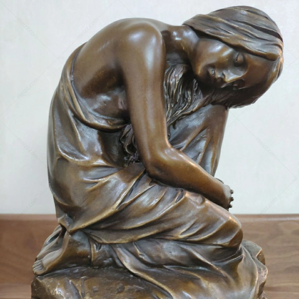 sleeping woman statue