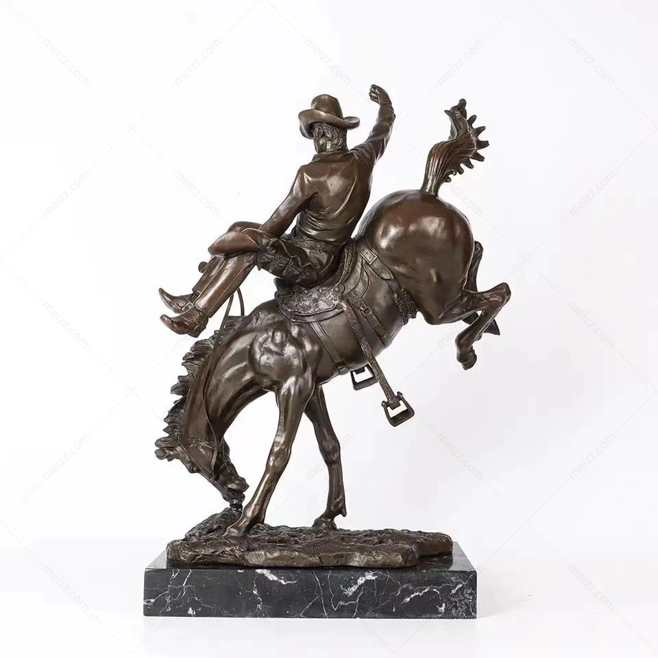 Cowboy on Bucking Horse Statue