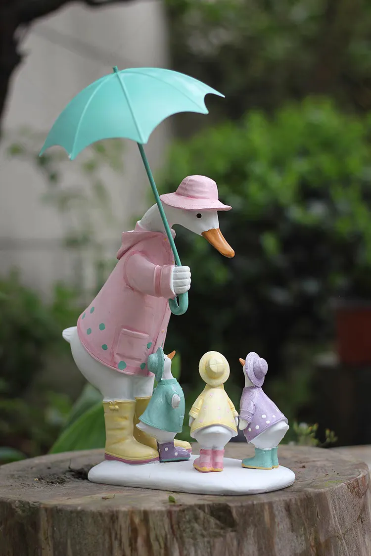duck with umbrella figurine
