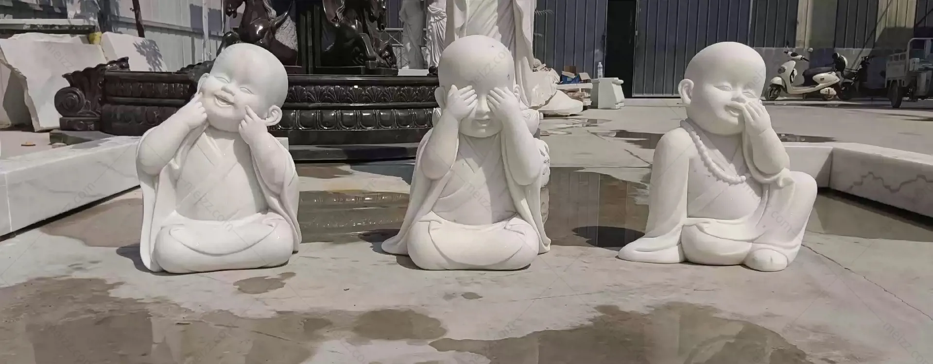 little monk sculpture