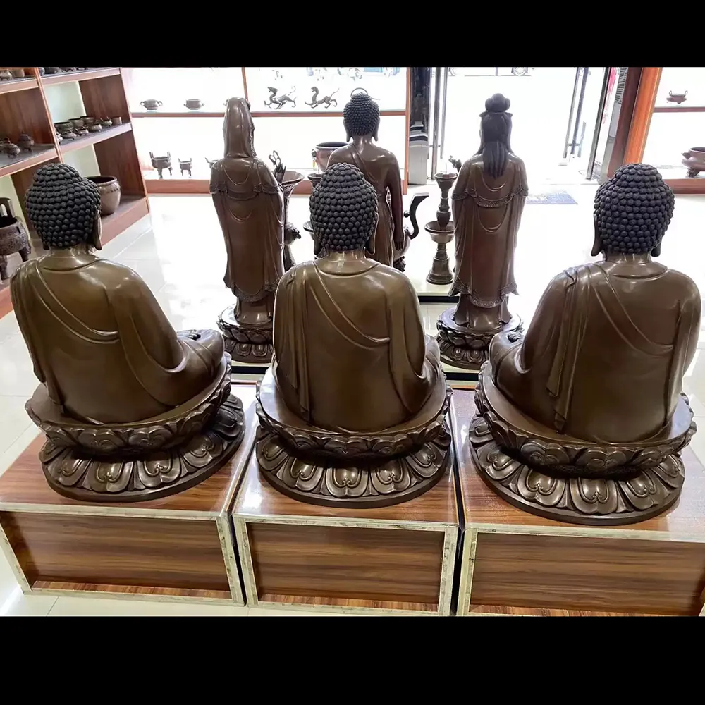 three buddha statue