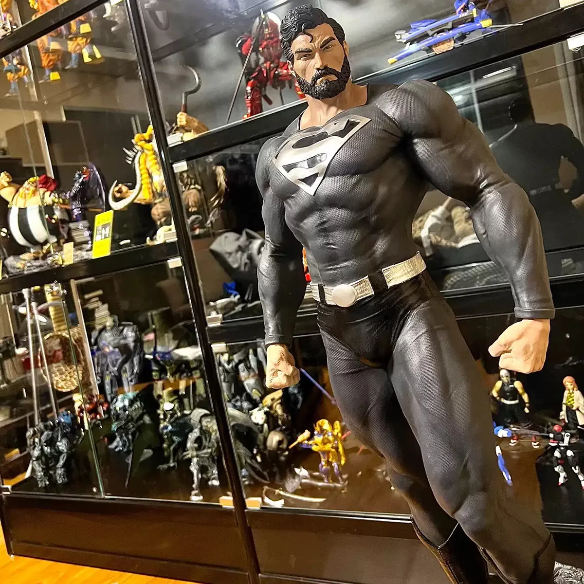 black suit superman statue