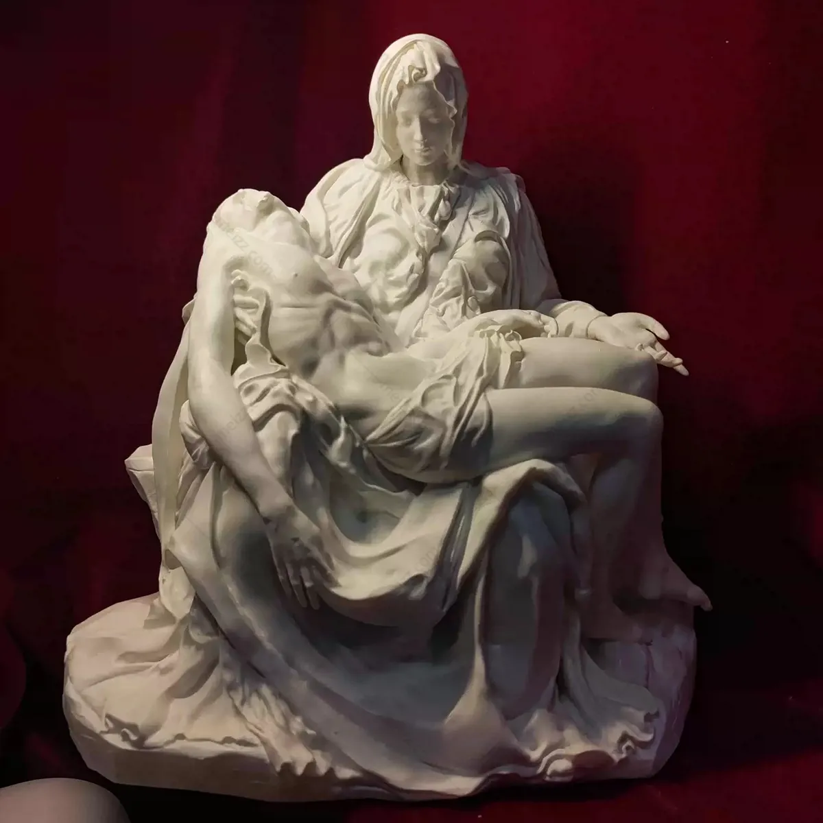 mother mary holding jesus statue