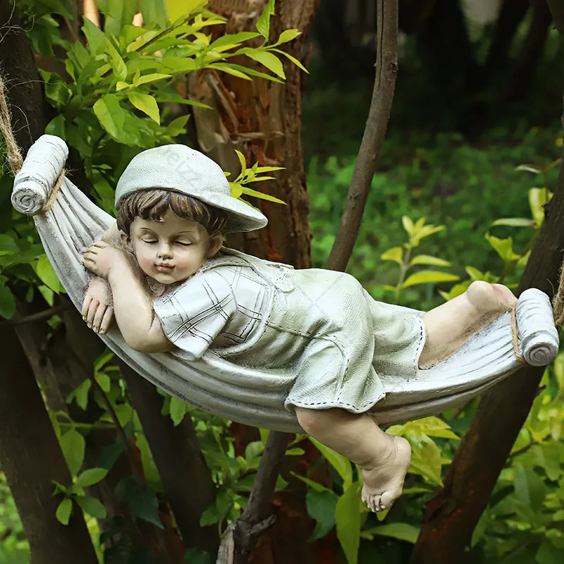 child on hammock statue