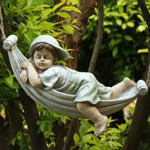 child on hammock statue