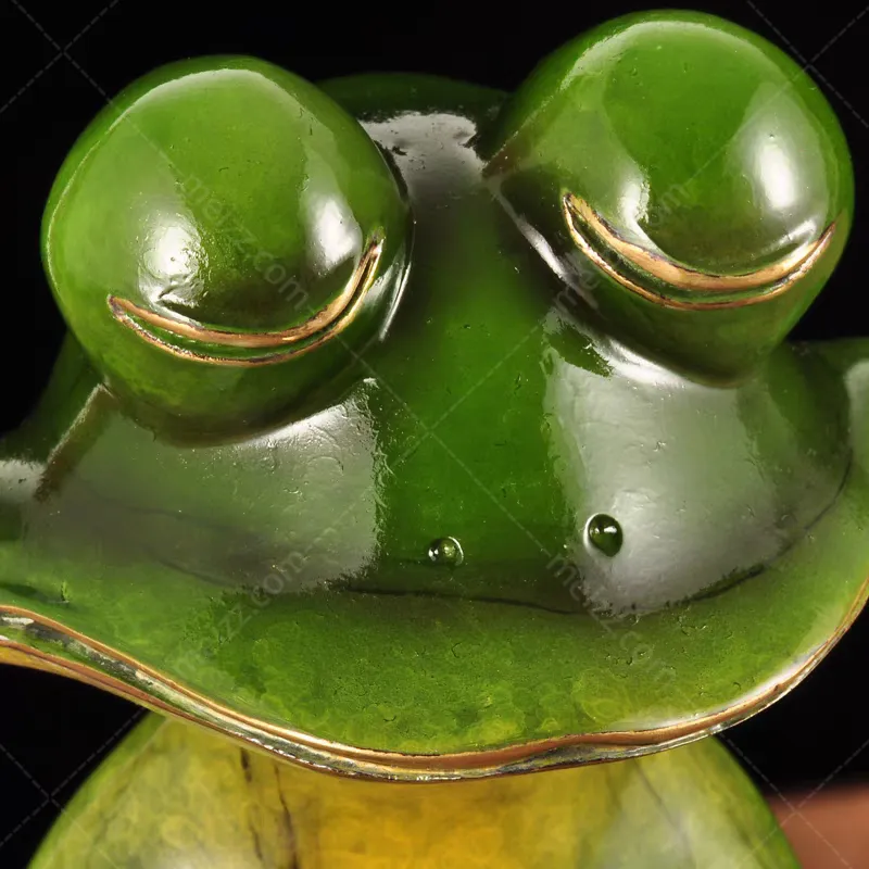 meditating frog statue