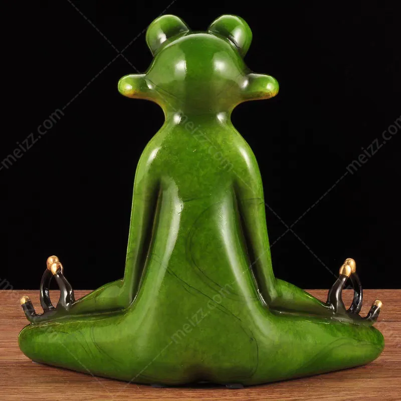 meditating frog statue