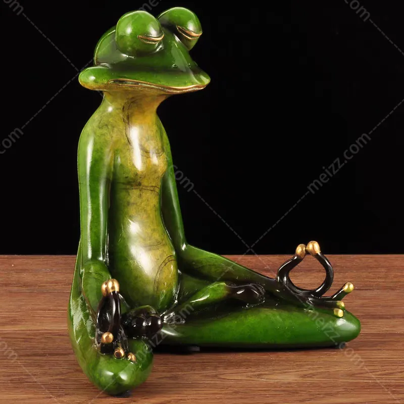 meditating frog statue