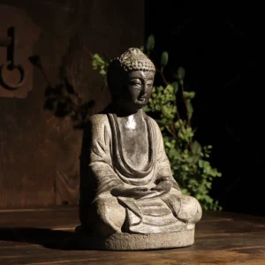 small stone buddha statue