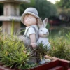 Boy And Rabbit Statue