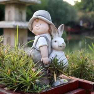 boy and rabbit statue