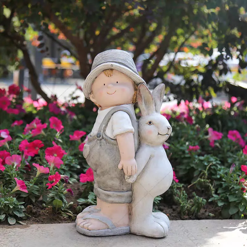 boy and rabbit statue