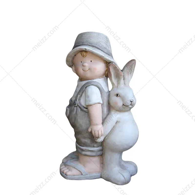 boy and rabbit statue