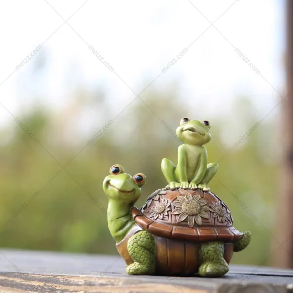 snail and frog garden statue