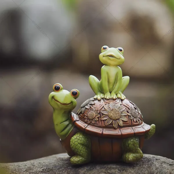 snail and frog garden statue