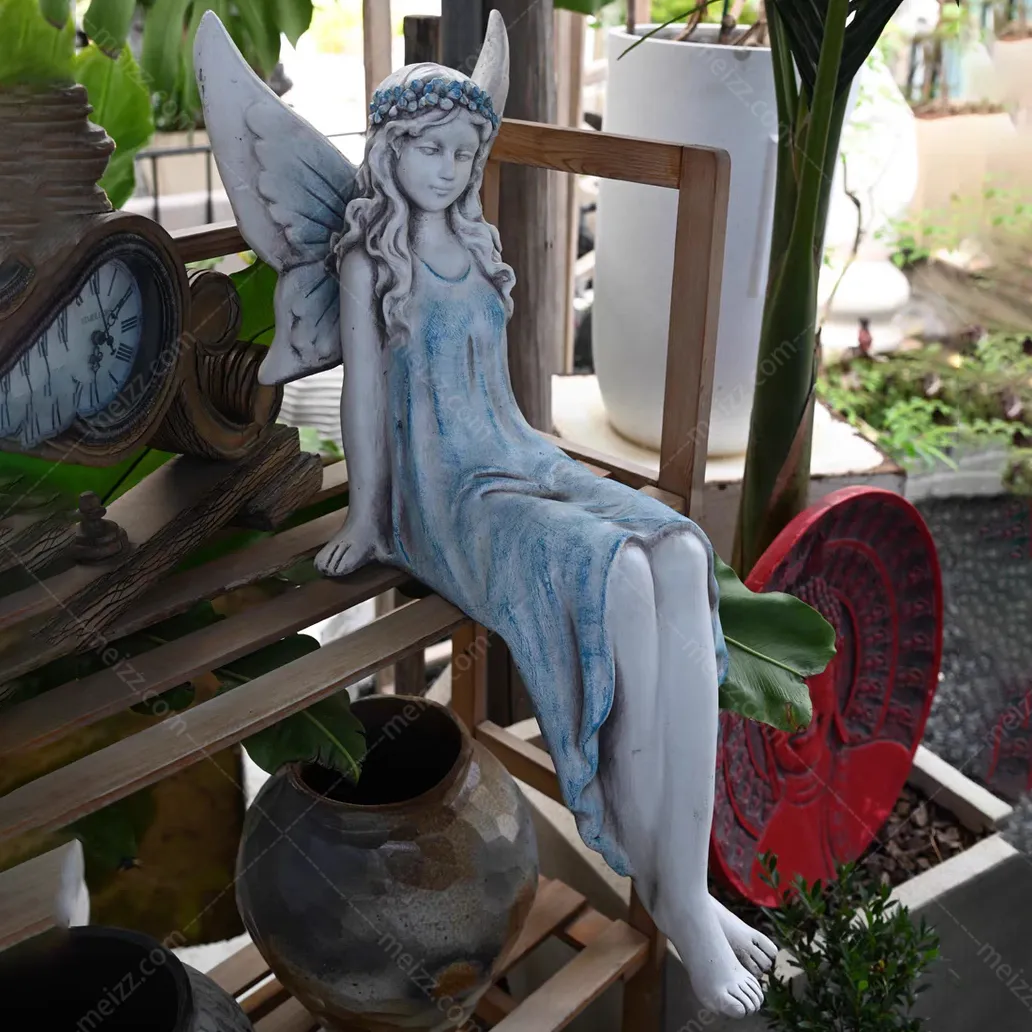 sitting garden angel
