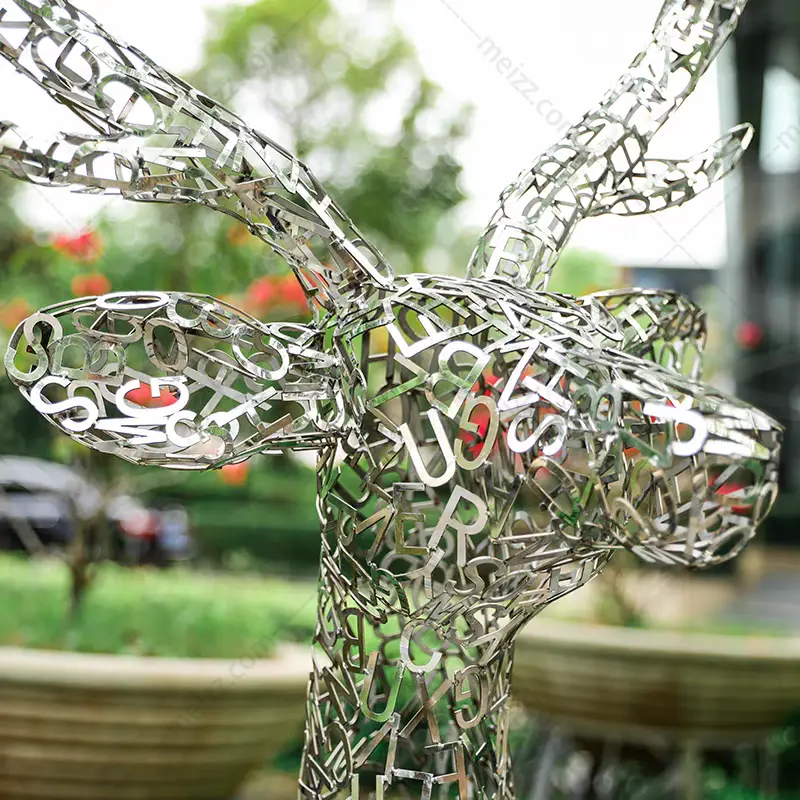 large silver deer statues