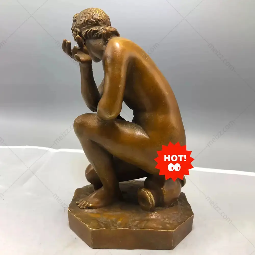 crouching aphrodite sculpture