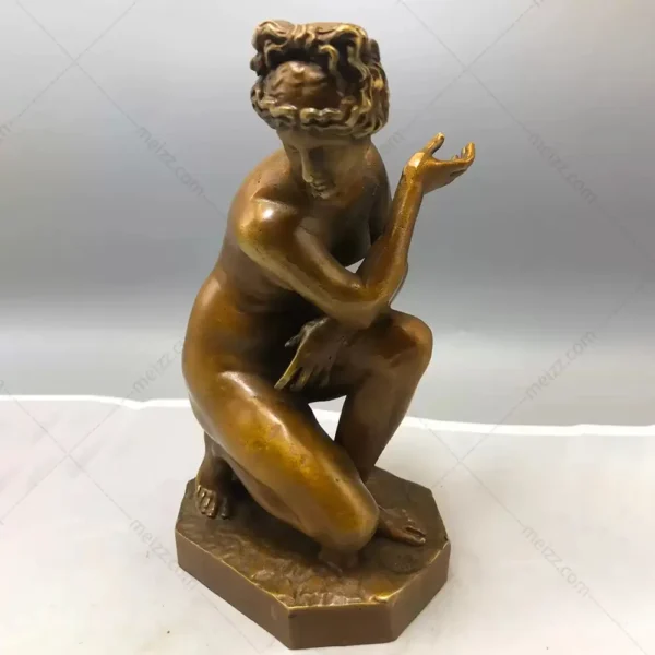crouching aphrodite sculpture