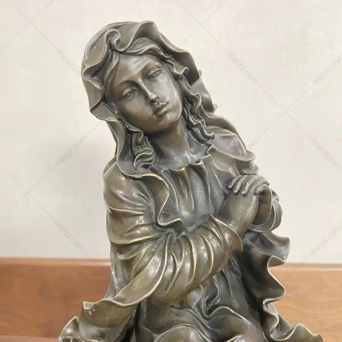 praying woman sculpture